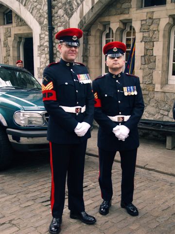 A picture of two active Military Policemen in Parade Dress
